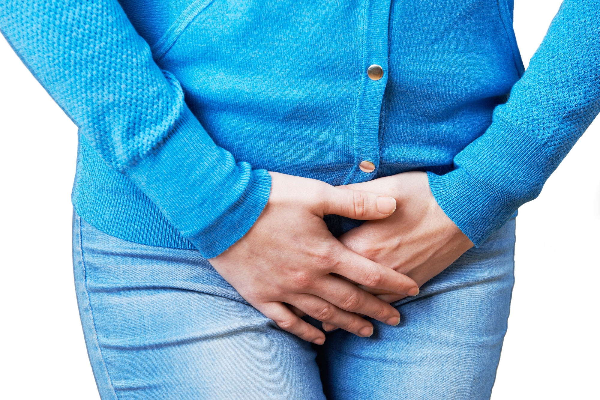 woman holding bladder in pain